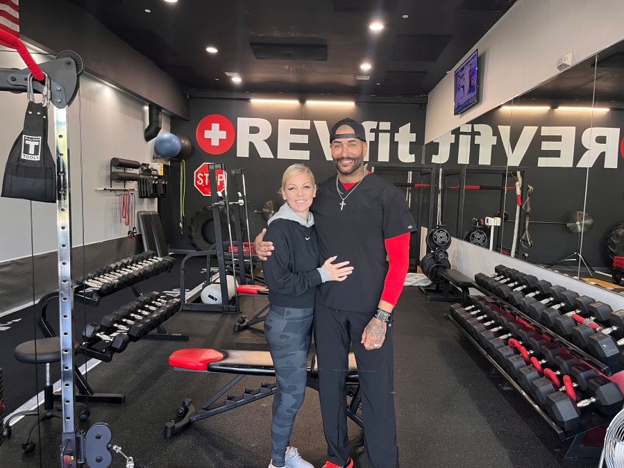 REVfit owner and personal trainer Autrey Stirgus with his wife.