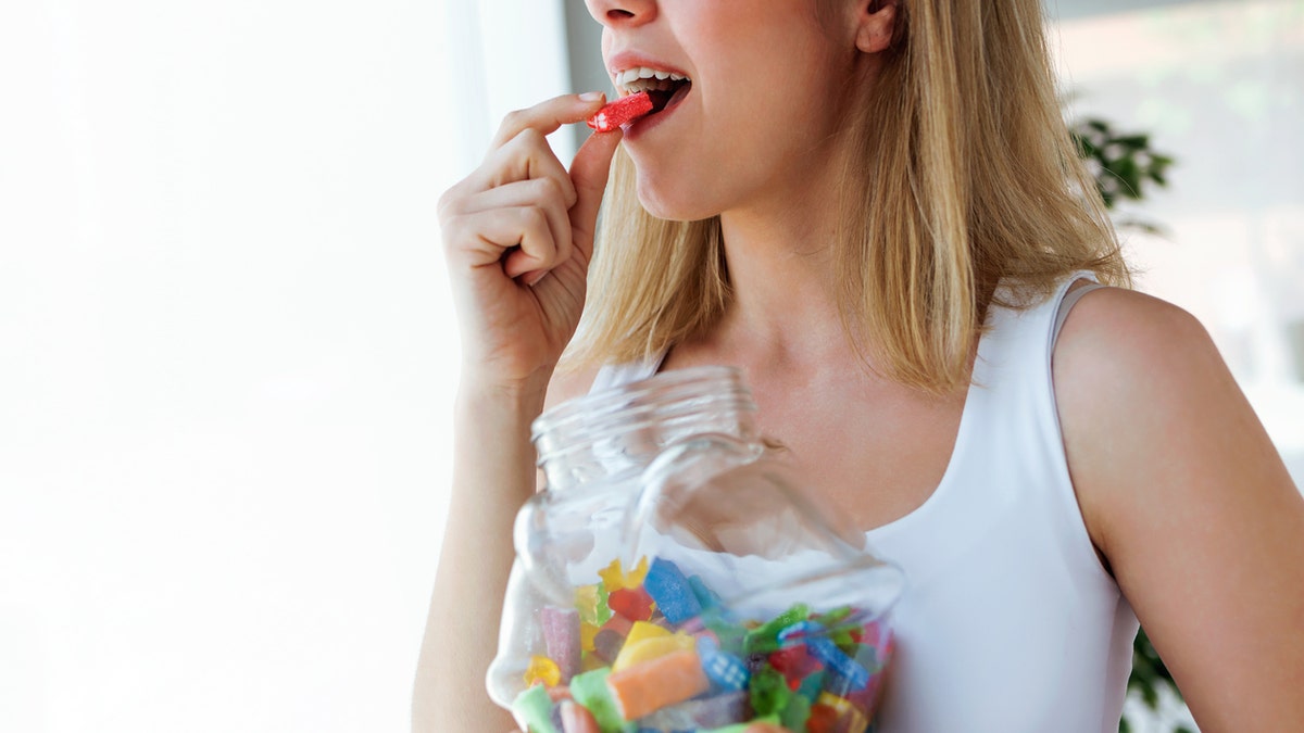 A woman eating a sweet